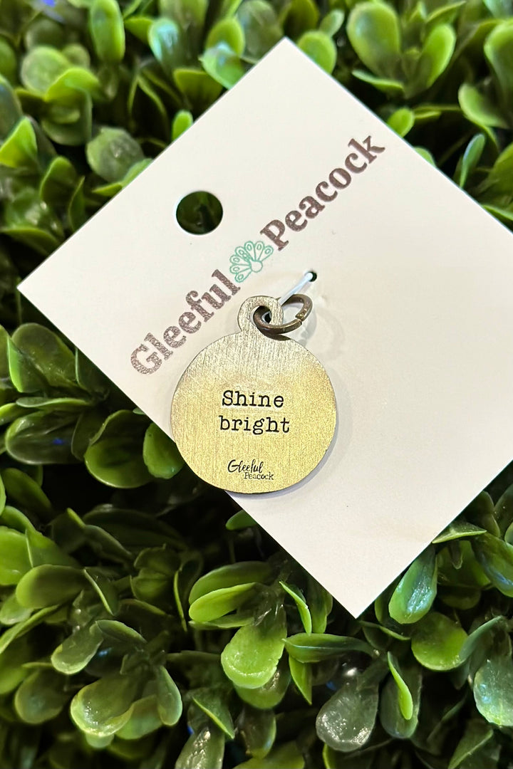 Gleeful Peacock Token Charm: Shine Bright