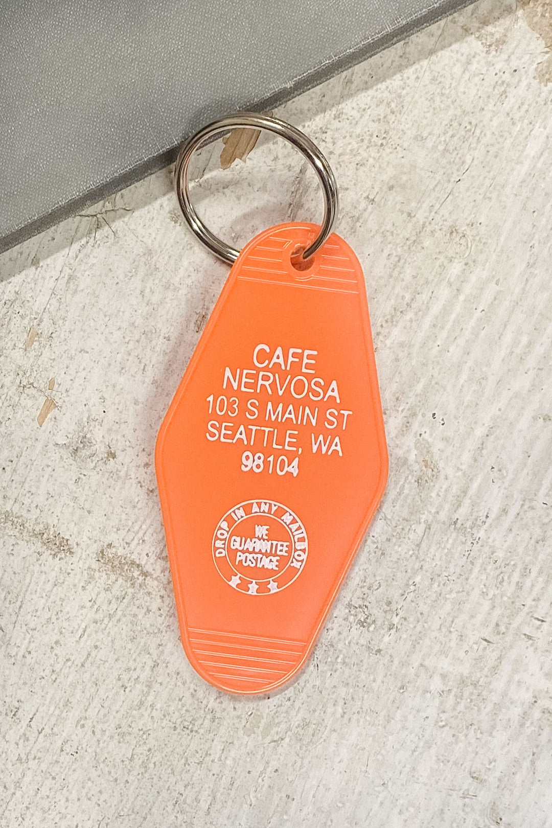 Cafe Nervosa Motel Keychain