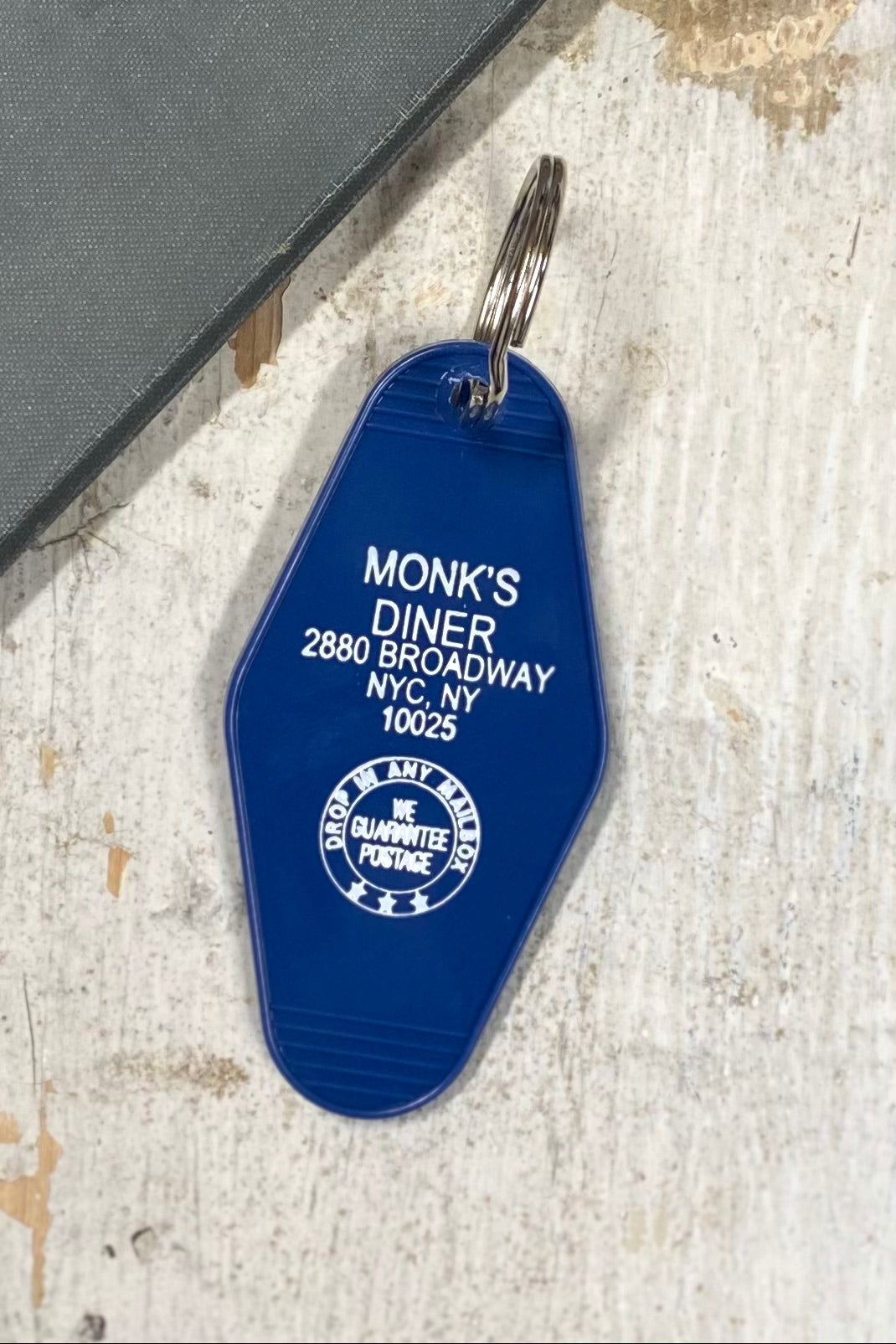 Monk's Diner Motel Keychain